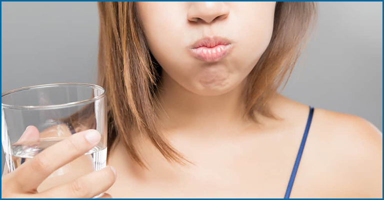Swishing your mouth after every meal or drink with clean water
