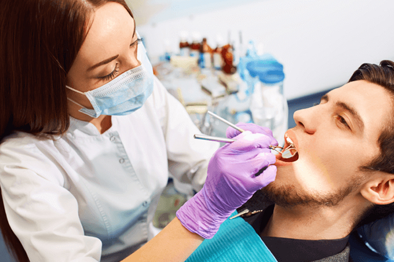 dentist treating patient