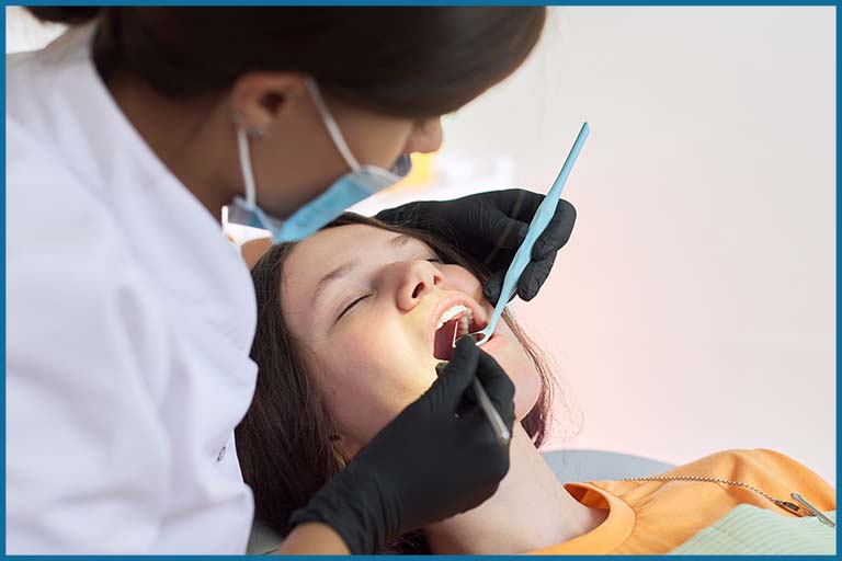 dentist treating patient